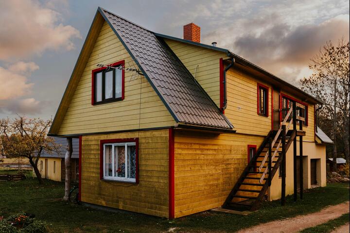 A yellow wooden house