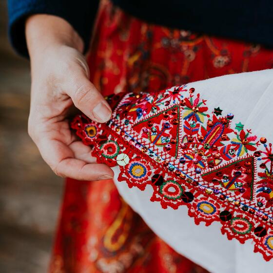 An intricately embroidered skirt edge