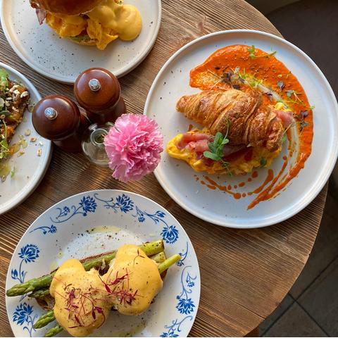 Breakfast dishes on the table at Lisbon's Seagull Method Cafe