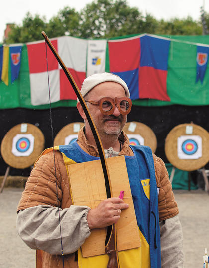 A man in fancy dress for a festival in Le Puy-en-Velay, France