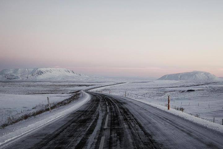 An icy road in a vast Icelandic expanse